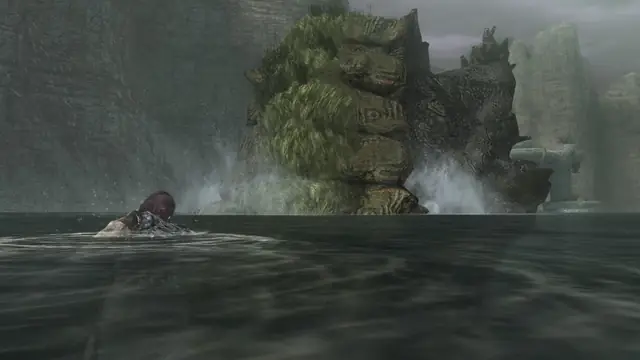 Wander swims toward a moss-covered colossus rising out of a lake