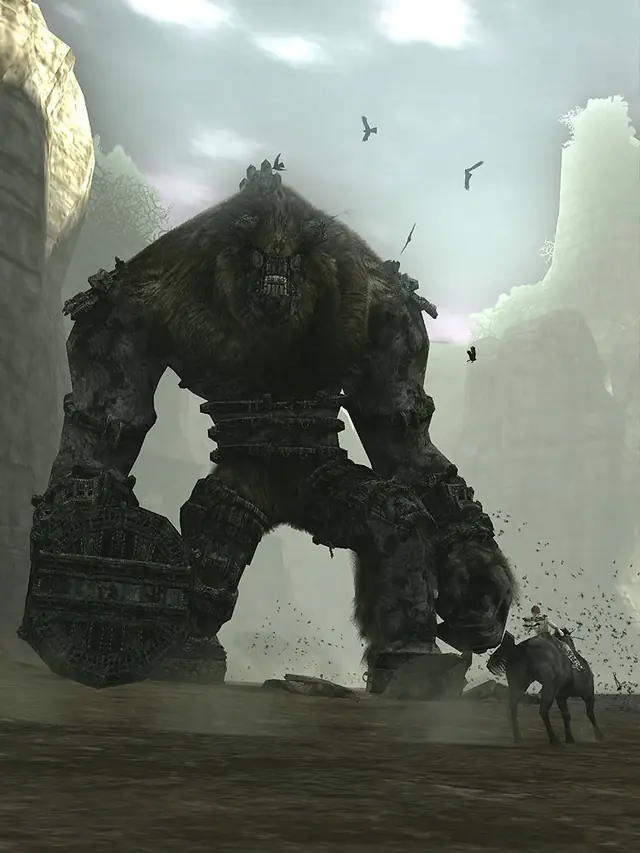 The cover art: a colossus strides through a canyon, Wander and Agro at its feet